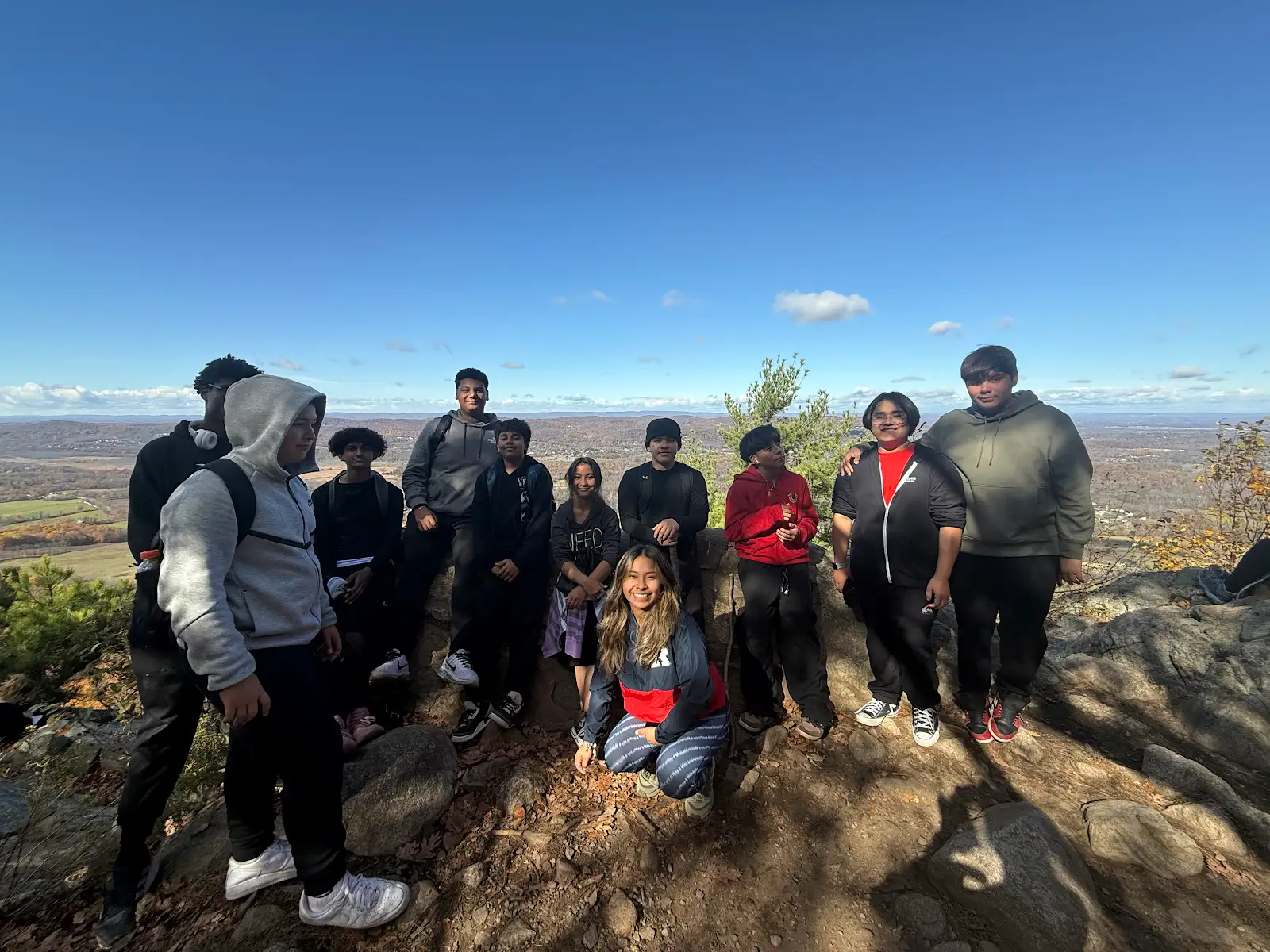 Group of students at a scenic mountain overlook